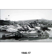 BLACK AND WHITE PICTURES - LOADING NEW 46'S ON TRANSPORT