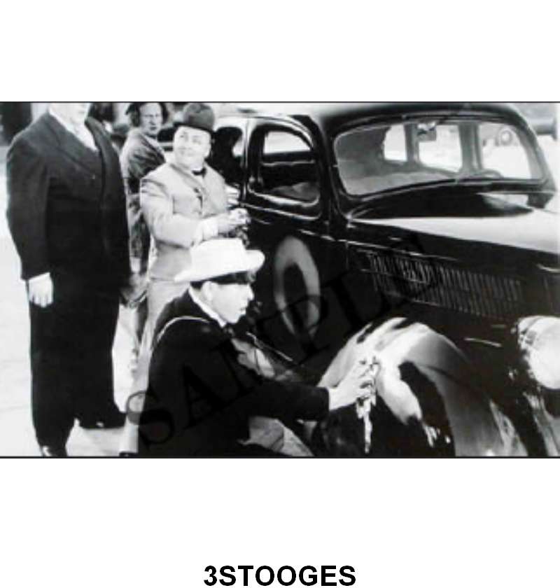 BLACK AND WHITE PICTURE - 3 STOOGES WITH 36 FORD SEDAN