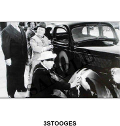 BLACK AND WHITE PICTURE - 3 STOOGES WITH 36 FORD SEDAN