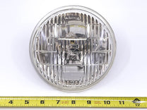 HALOGEN HEAD LIGHT BULB - 60-76 CARS 5-3/4" LOW BEAM W/"FoMoCo "