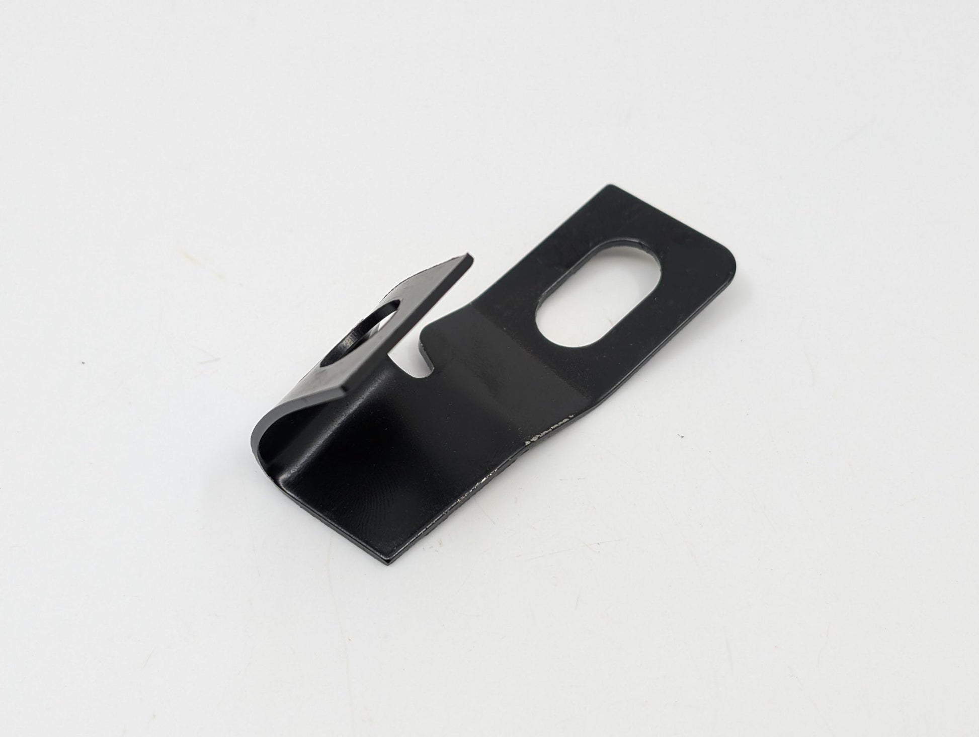 FRONT FENDER TO BUMPER BRACKET - 64-66 MUSTANG LH