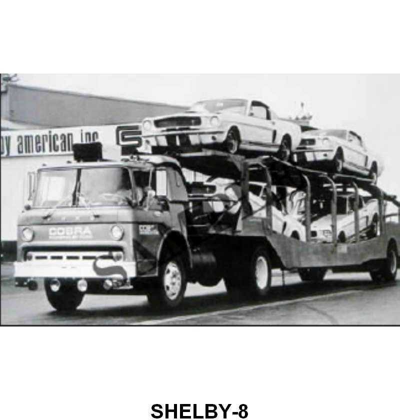 BLACK AND WHITE PICTURE - CAR HAULER WITH 65 SHELBY GT-350S